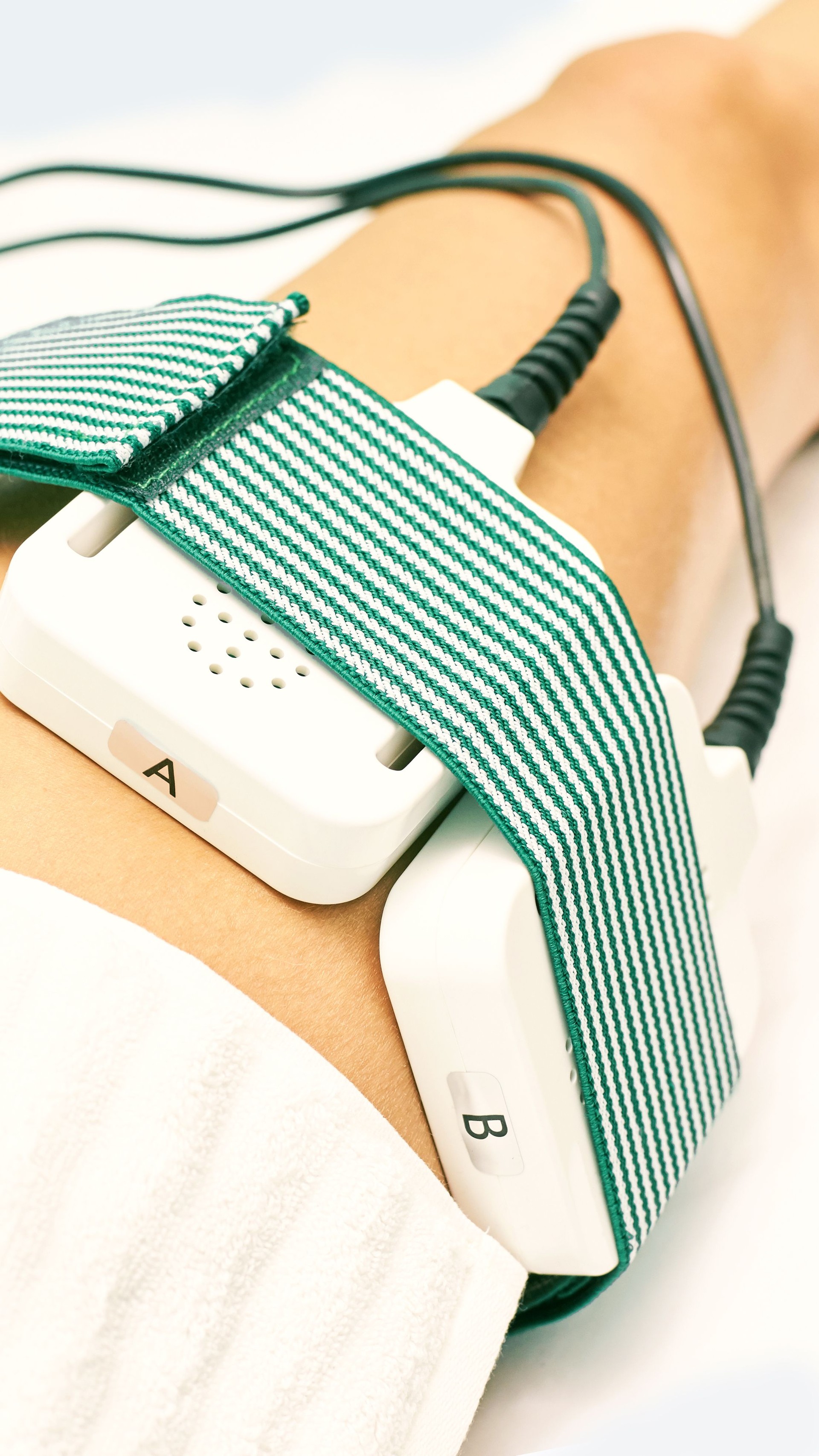 Laser lipo equipment. Cosmetic fat reduce treatment. Woman in medicine salon. Anti cellulite procedure